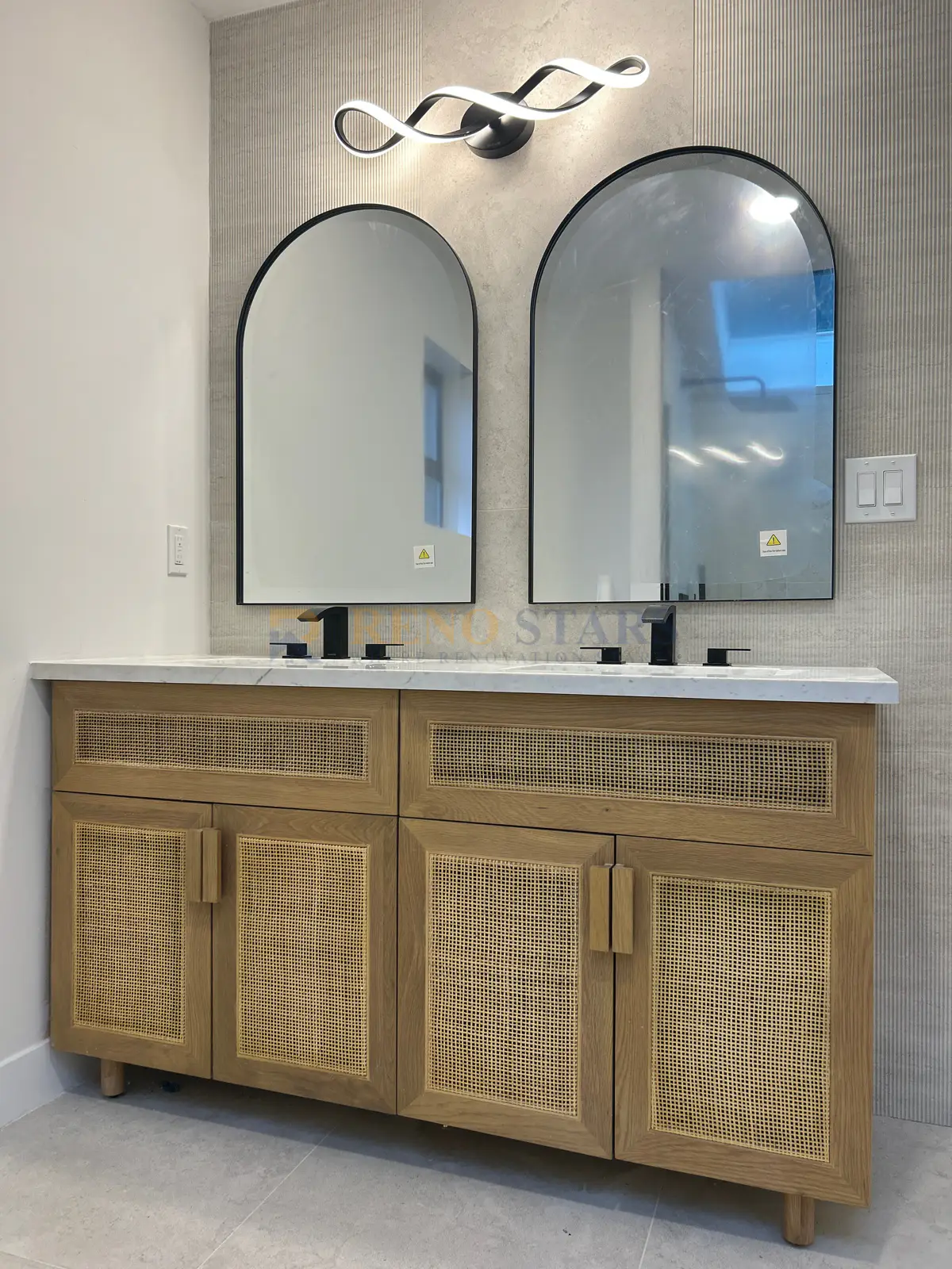 Luxury curbless walk-in shower with tile surround in a North Vancouver bathroom