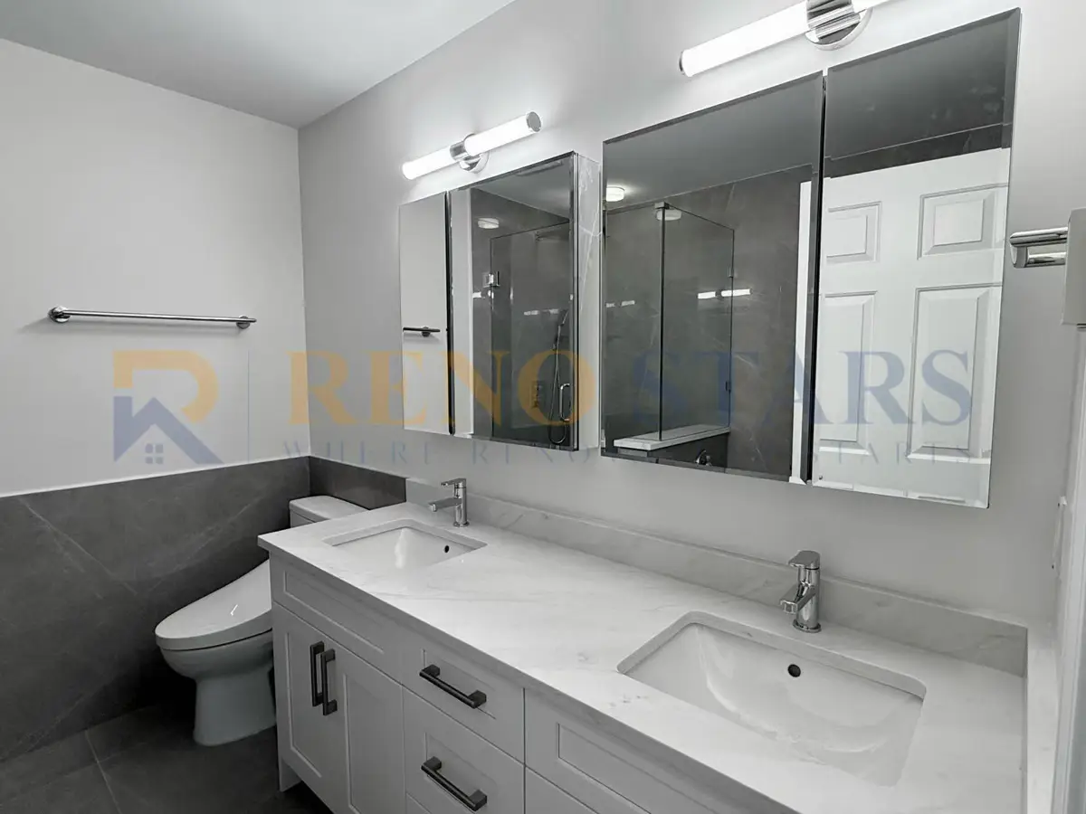 Before and after comparison: master bathroom showing large-format grey porcelain tile and frameless glass enclosure