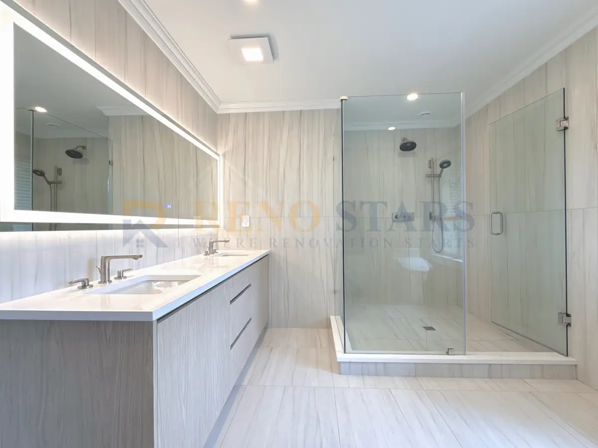 Split bathroom renovation with custom cabinets and dual vanity in West Vancouver